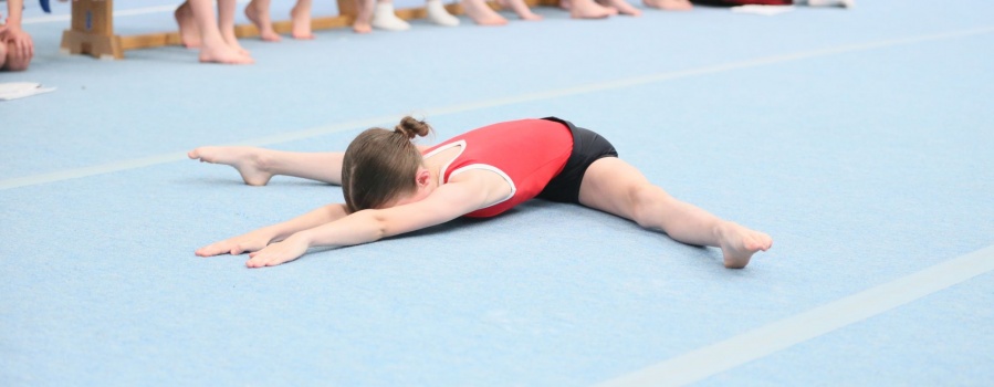 Recreational Gymnasts practising headstands